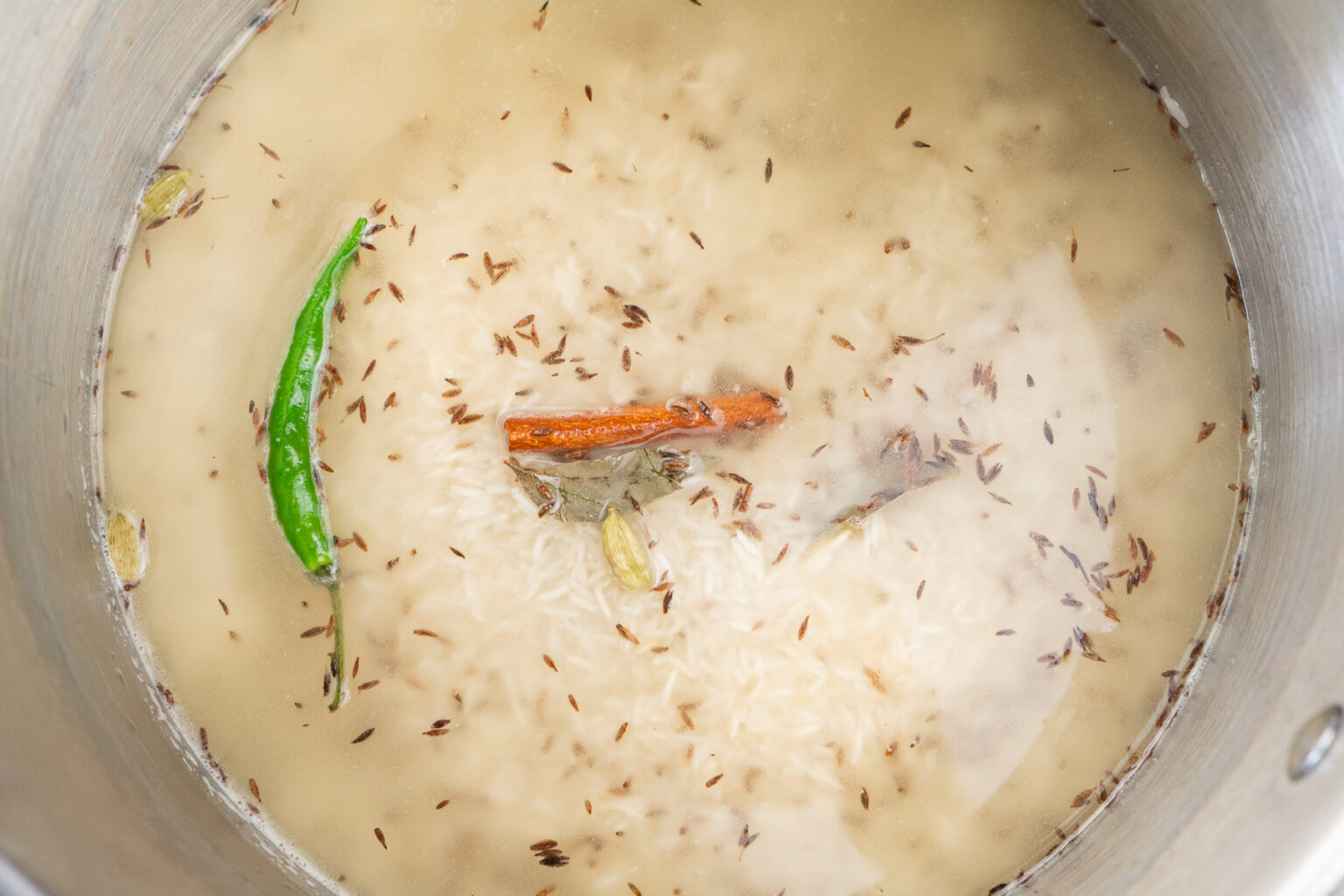 Jeera Rice (Indian Cumin Rice Recipe) - in a Saucepan by Flawless Food