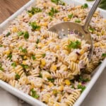 Scooping our tuna pasta salad up with a metal ladle