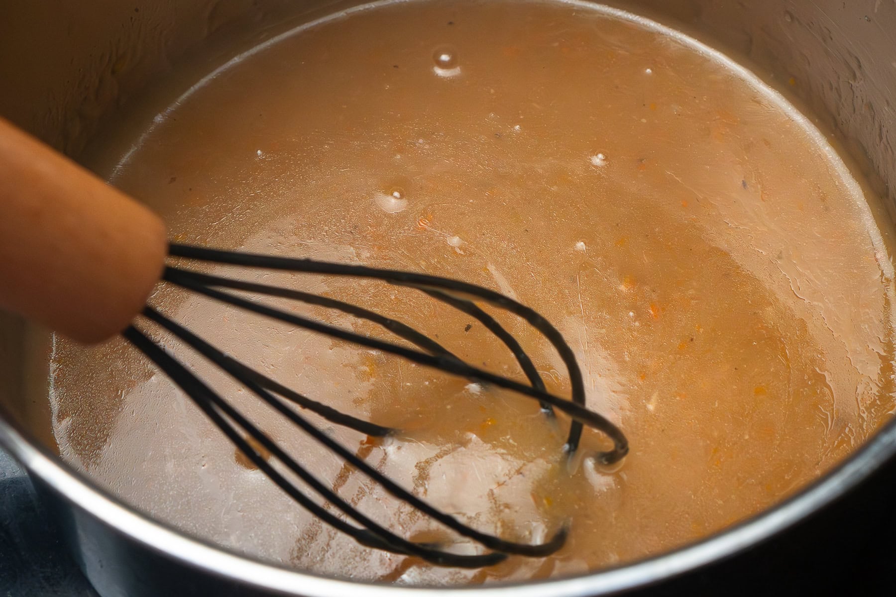 Whisking turkey gravy