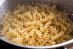 Cooked pasta in a sieve