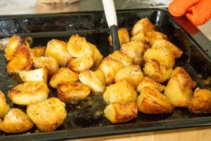 Roast potatoes coated in beef juices before crisping for the final 10 minutes.