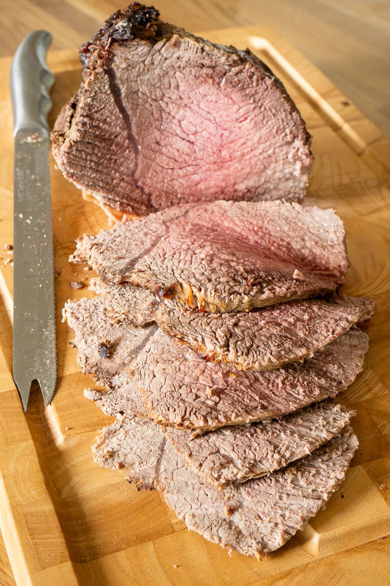 Medium cooked roast top rump beef carved slices